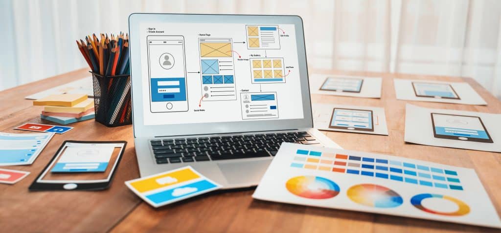 Digital wireframe design for web or mobile app UI on laptop. Scrutinize